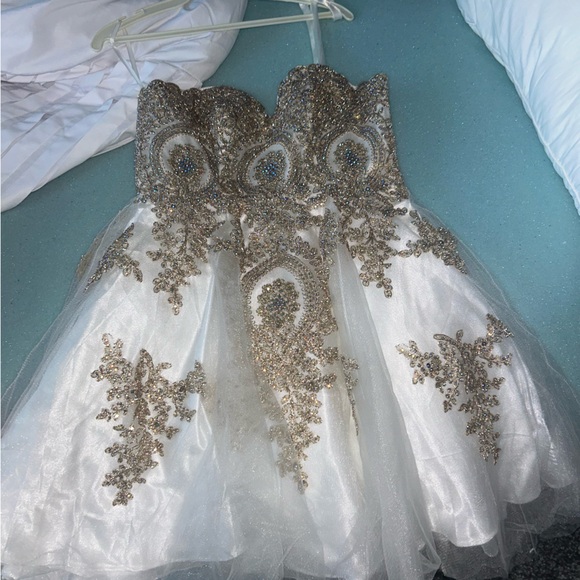 Homecoming Dress. White tool with beautiful gem and gold detailing.